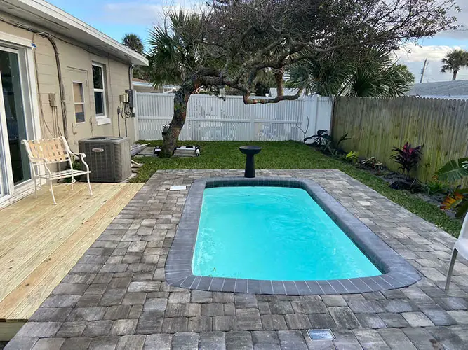 small backyard pool paver deck