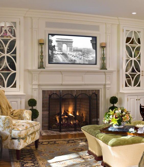 traditional electric fireplace insert ideas with TV above