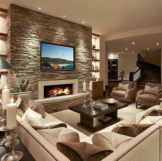 stone electric fireplace ideas with TV above and bookcases