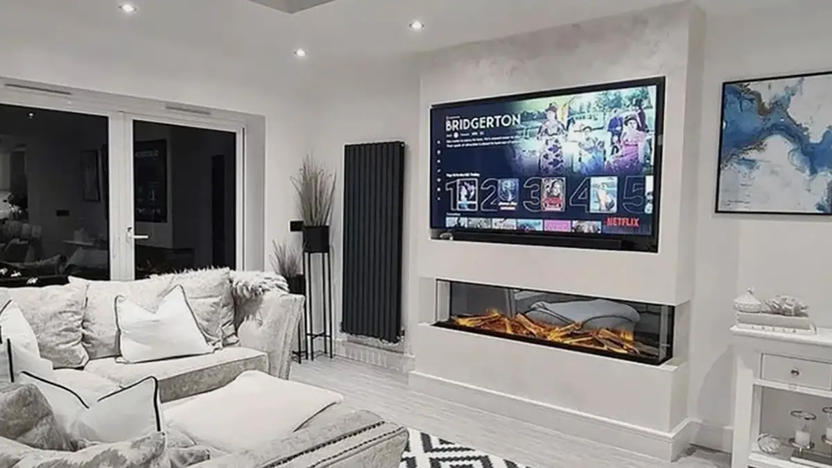 electric fireplace with TV above